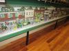 A miniature parade with floats depicts various 4-H projects and activities.